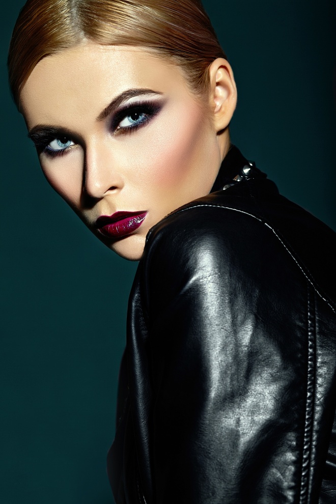 High fashion look.glamor closeup portrait of beautiful sexy stylish Caucasian young woman model with bright modern makeup, with dark red lips,  with perfect clean skin